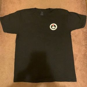 Vans “Off the Wall” tee-shirt.